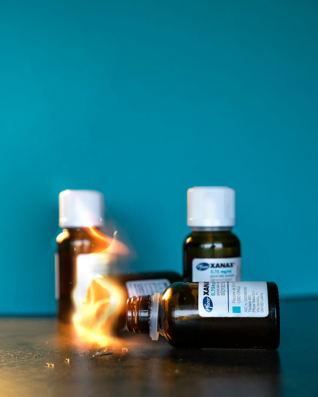 two-bottles-of-essential-oils-on-a-table-jyy7e-9cyo8